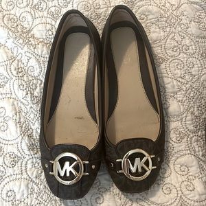 A pair of Michael Kors Brown loafers like new only worn a couple times